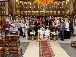 Groepsfoto kerkbezoek groep NEOS uit As